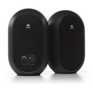 JBL 104-BT par kompaktnih studijskih monitora crne boje ovalnog oblika sa prednjom kontrolom jačine zvuka i Bluetooth oznakom